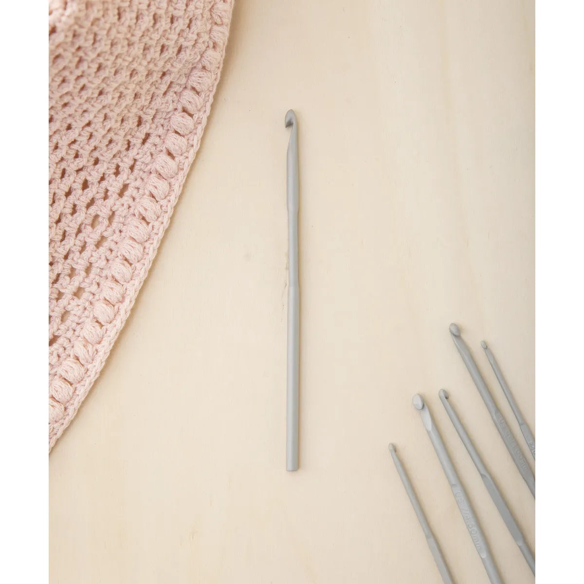 PVC crochet hook. Colour: Grey