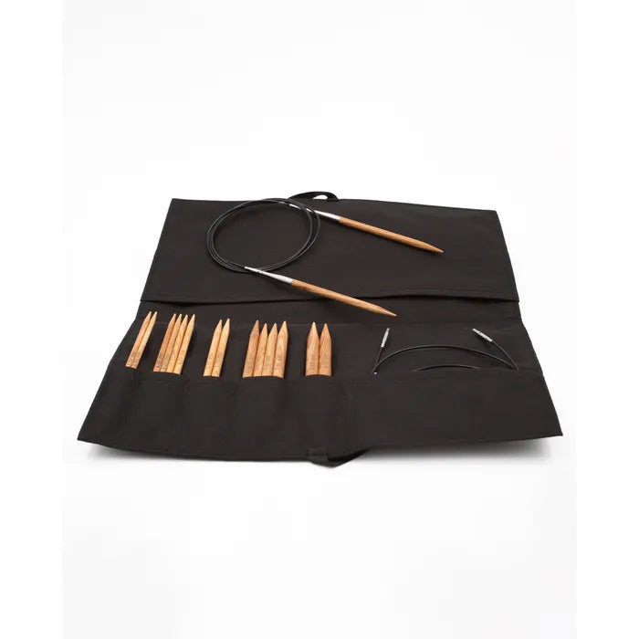 Complete set of circular knitting needles in wood. Color: Natural